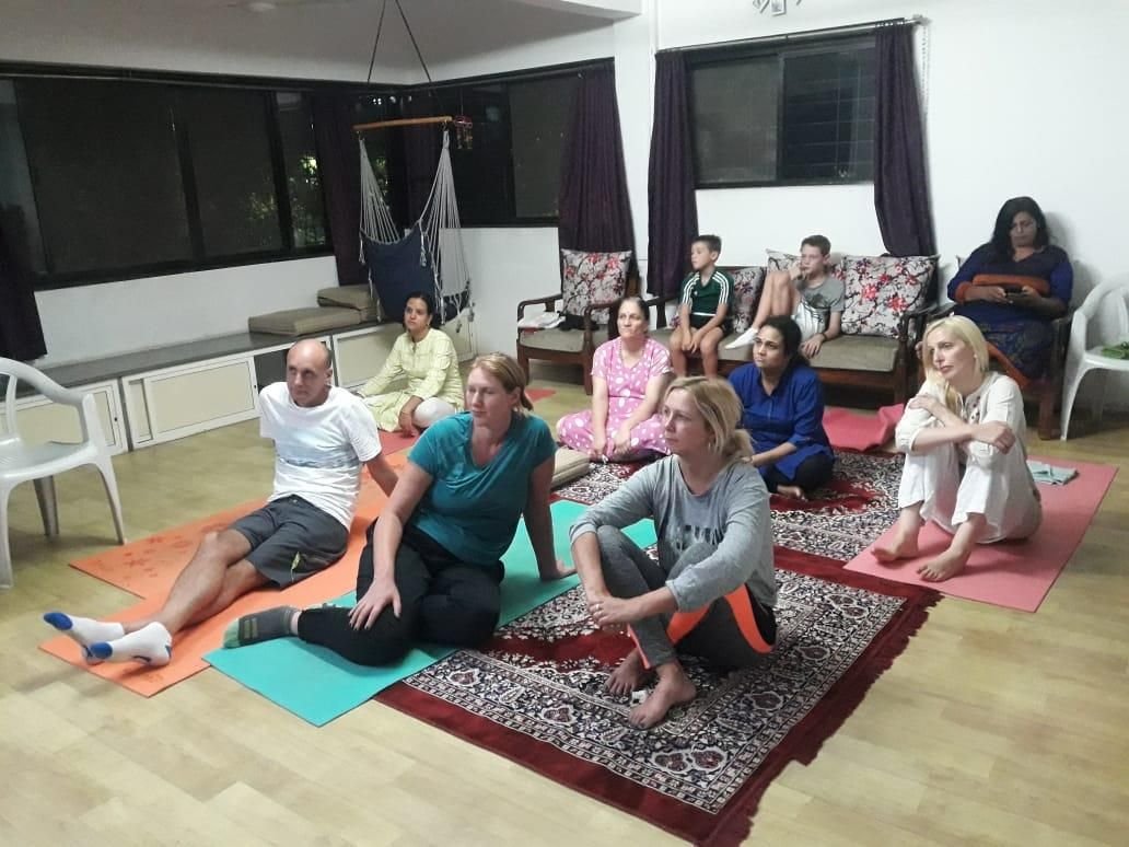 Guided yoga practice with international students